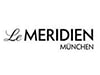 Logo vom Le Méridien Hotel München direkt gegenüber vom Münchner Hauptbahnhof liegt.